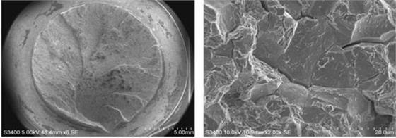 图12-61 断口低倍形貌 图12-62 裂纹起源处微观形貌